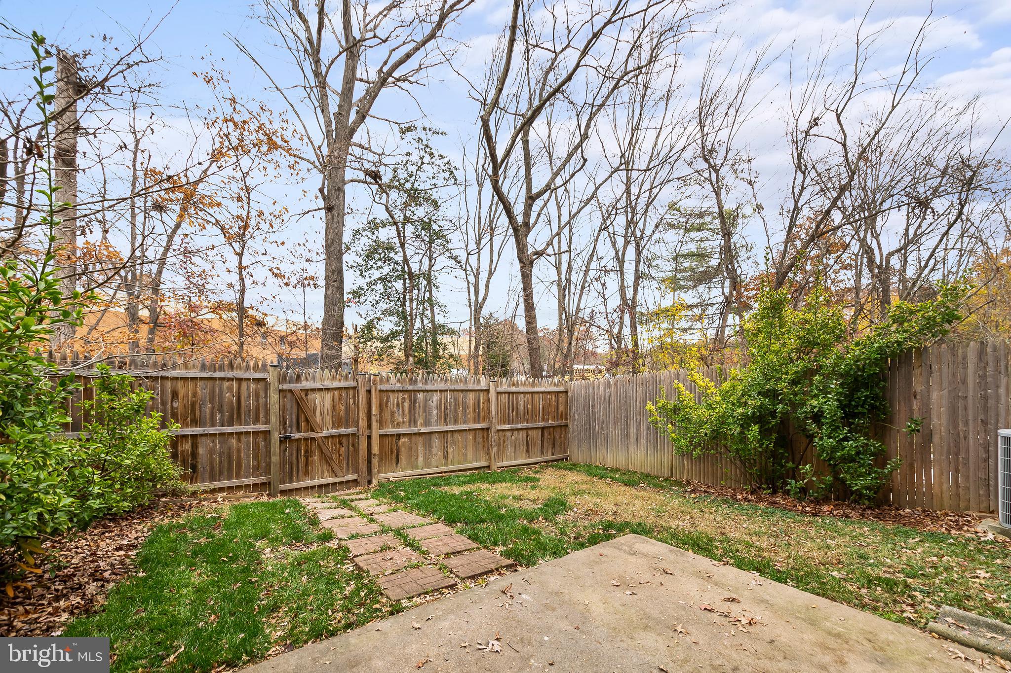 9518 Hunt Square Court Springfield, VA 22153 - Photo 38 of 39 a backyard of a house with lots of green space
