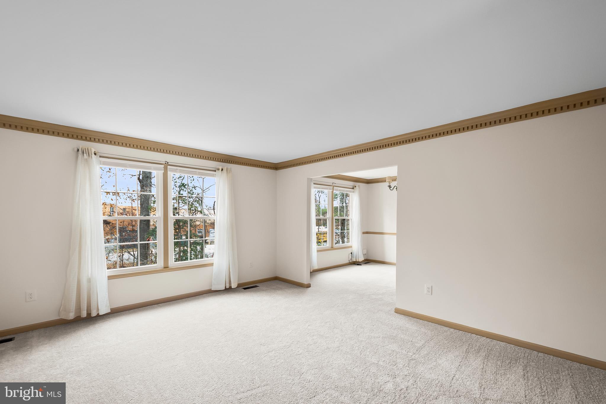 9518 Hunt Square Court Springfield, VA 22153 - Photo 7 of 39 an empty room with windows
