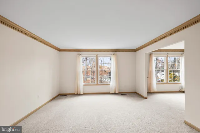 an empty room with windows