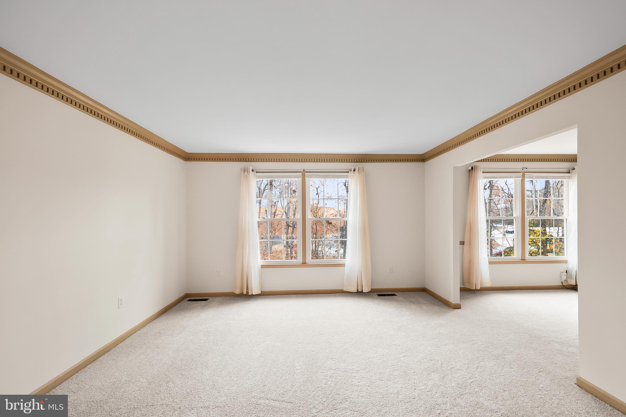 9518 Hunt Square Court Springfield, VA 22153 - Photo 8 of 39 an empty room with windows
