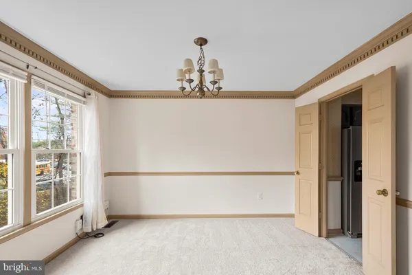 a view of a room with a large window