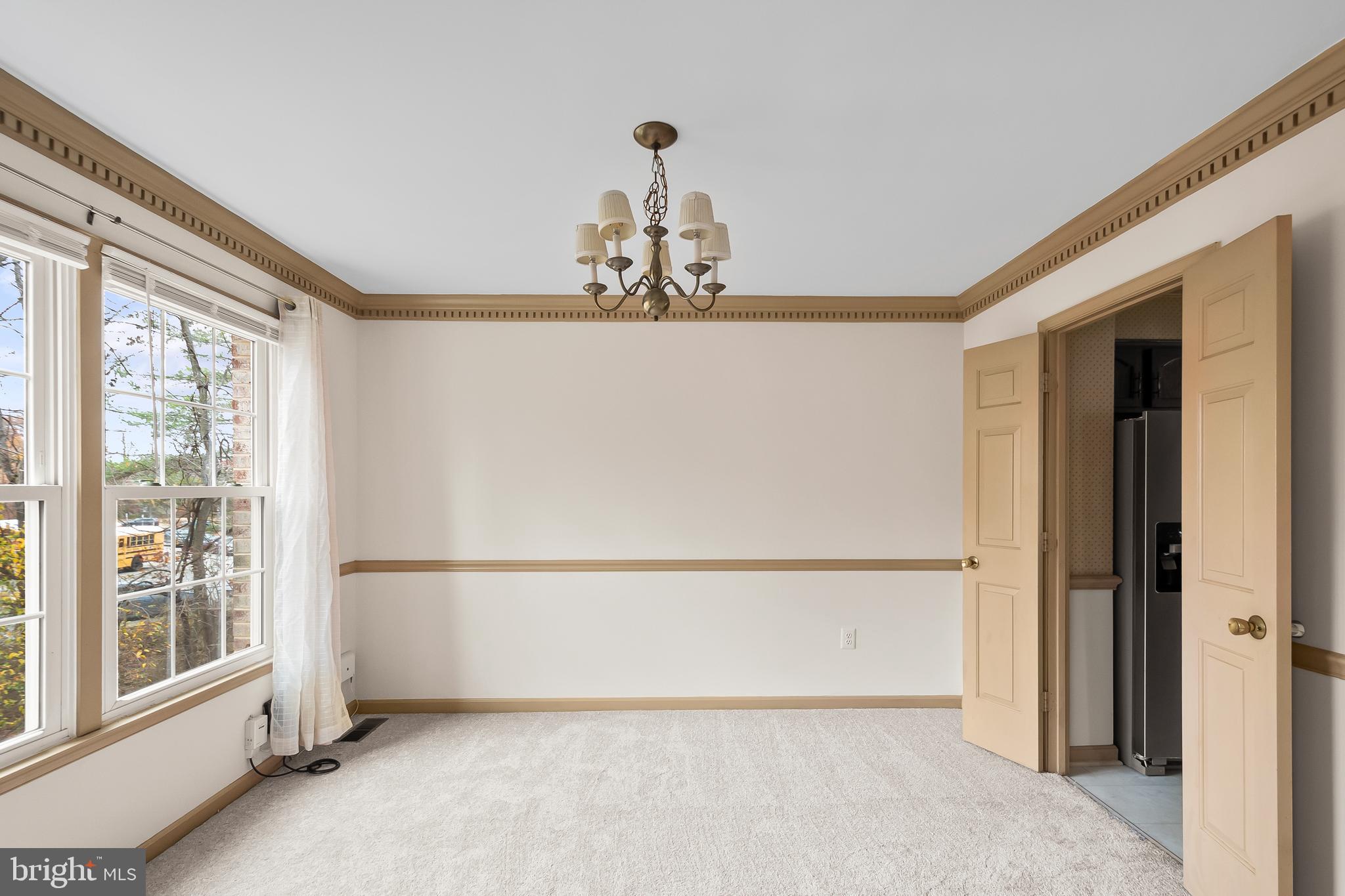 9518 Hunt Square Court Springfield, VA 22153 - Photo 10 of 39 a view of a room with a large window