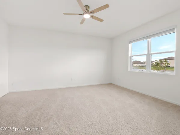 a view of a room with a window