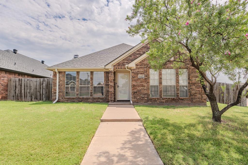 6027 Oakmont Drive Wichita Falls, TX 76310 - Photo 2 of 40 a front view of a house with yard