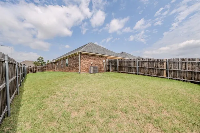 a view of a house with a garden