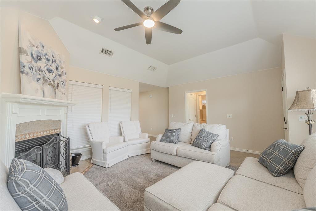 6027 Oakmont Drive Wichita Falls, TX 76310 - Photo 6 of 40 a living room with furniture and a chandelier