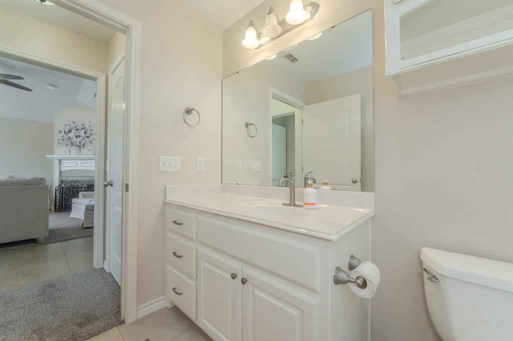 6027 Oakmont Drive Wichita Falls, TX 76310 - Photo 8 of 40 a bathroom with a sink a toilet and shower
