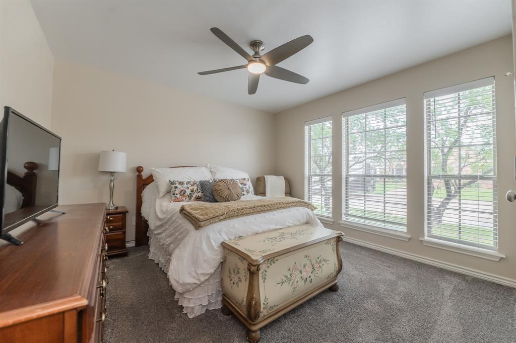 6027 Oakmont Drive Wichita Falls, TX 76310 - Photo 9 of 40 a living room with furniture and flat screen tv