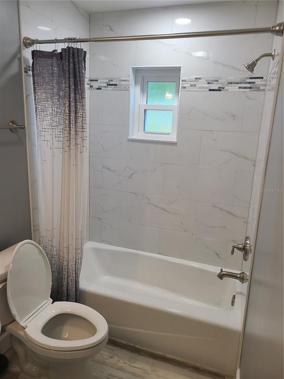 500 Coker Road Fort Pierce, FL 34945 - Photo 11 of 15 a bathroom with a toilet and a shower