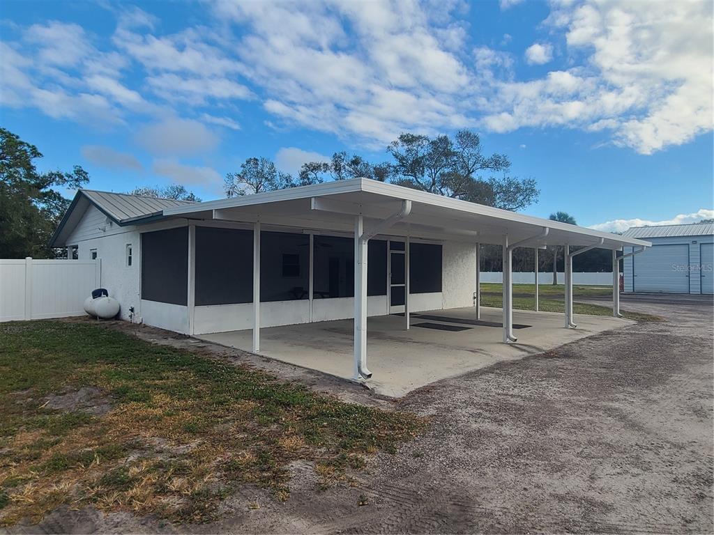 500 Coker Road Fort Pierce, FL 34945 - Photo 15 of 15 a view of a house with a yard