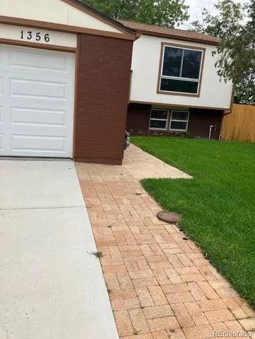 a front view of house with yard