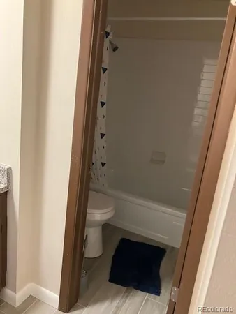 a bathroom with a sink and toilet