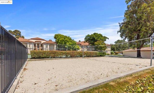 a view of terrace with wooden fence