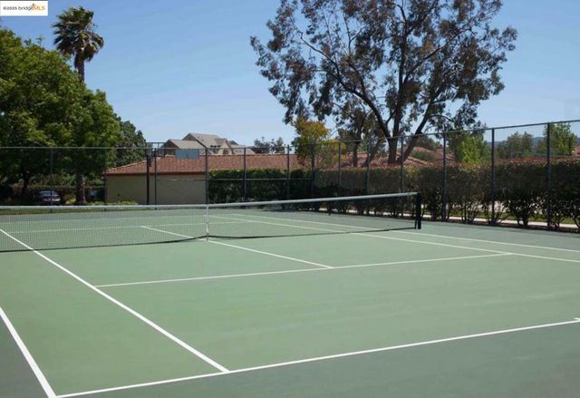 a front view of building with yard