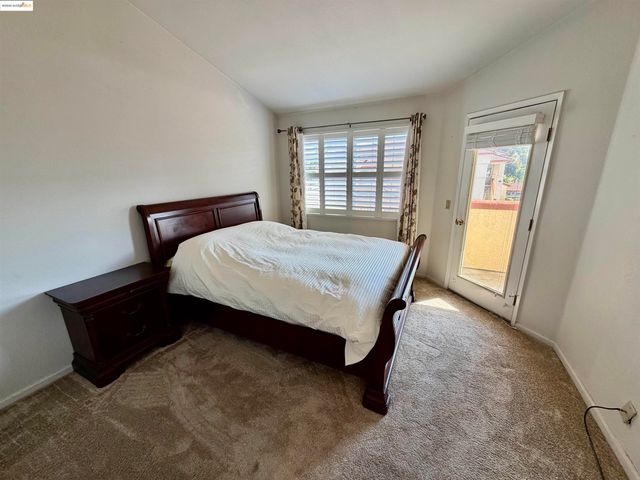 a kitchen with a stove and a sink