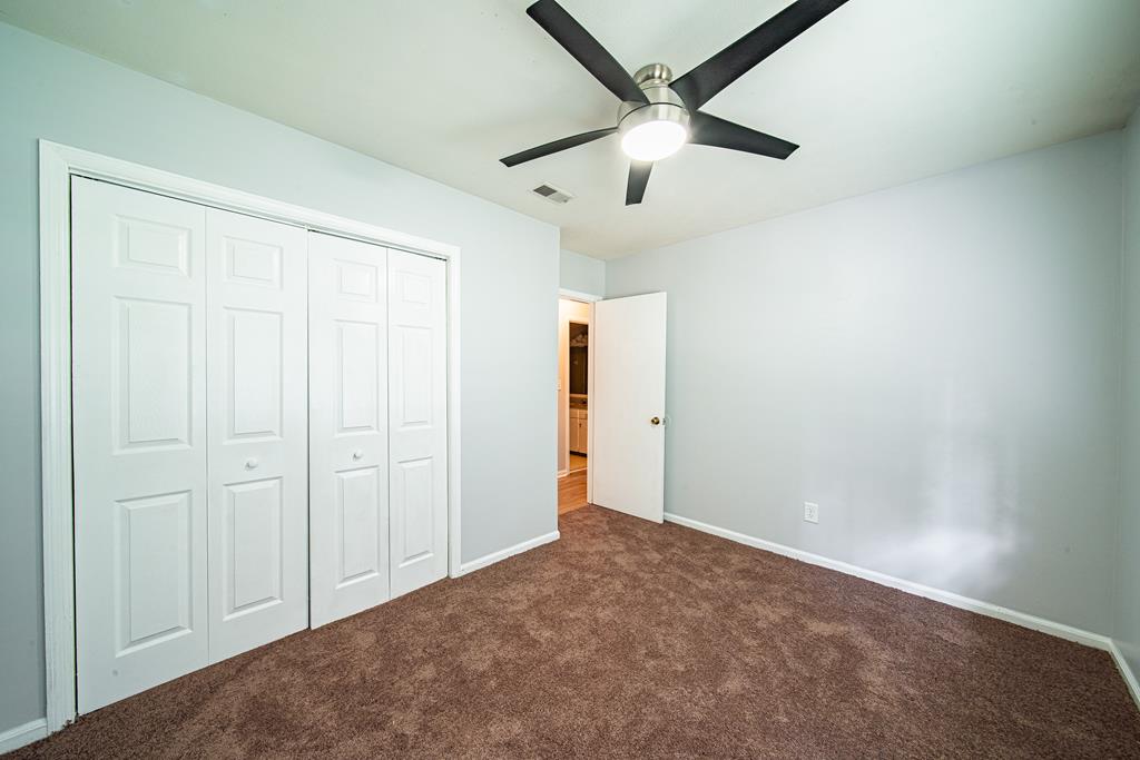 4 Clausen Drive Columbus, GA 31907 - Photo 24 of 27 an empty room with fan