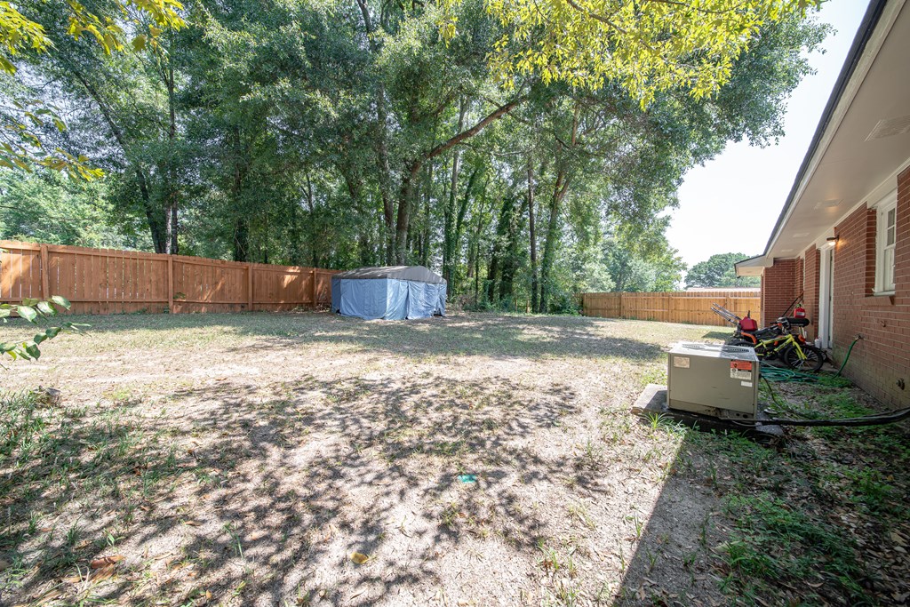 4 Clausen Drive Columbus, GA 31907 - Photo 26 of 27 a view of a backyard with large trees