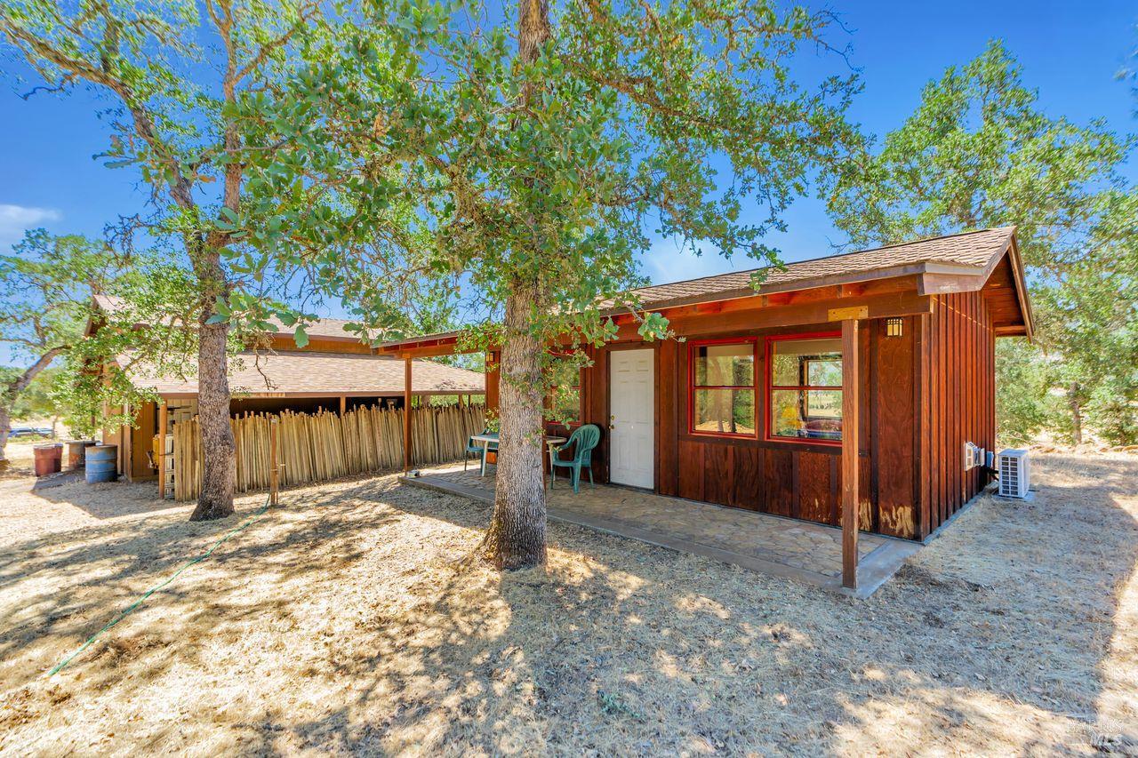 17277 Butts Canyon Road Middletown, CA 95461 - Photo 2 of 41 a front view of a house with a outdoor space