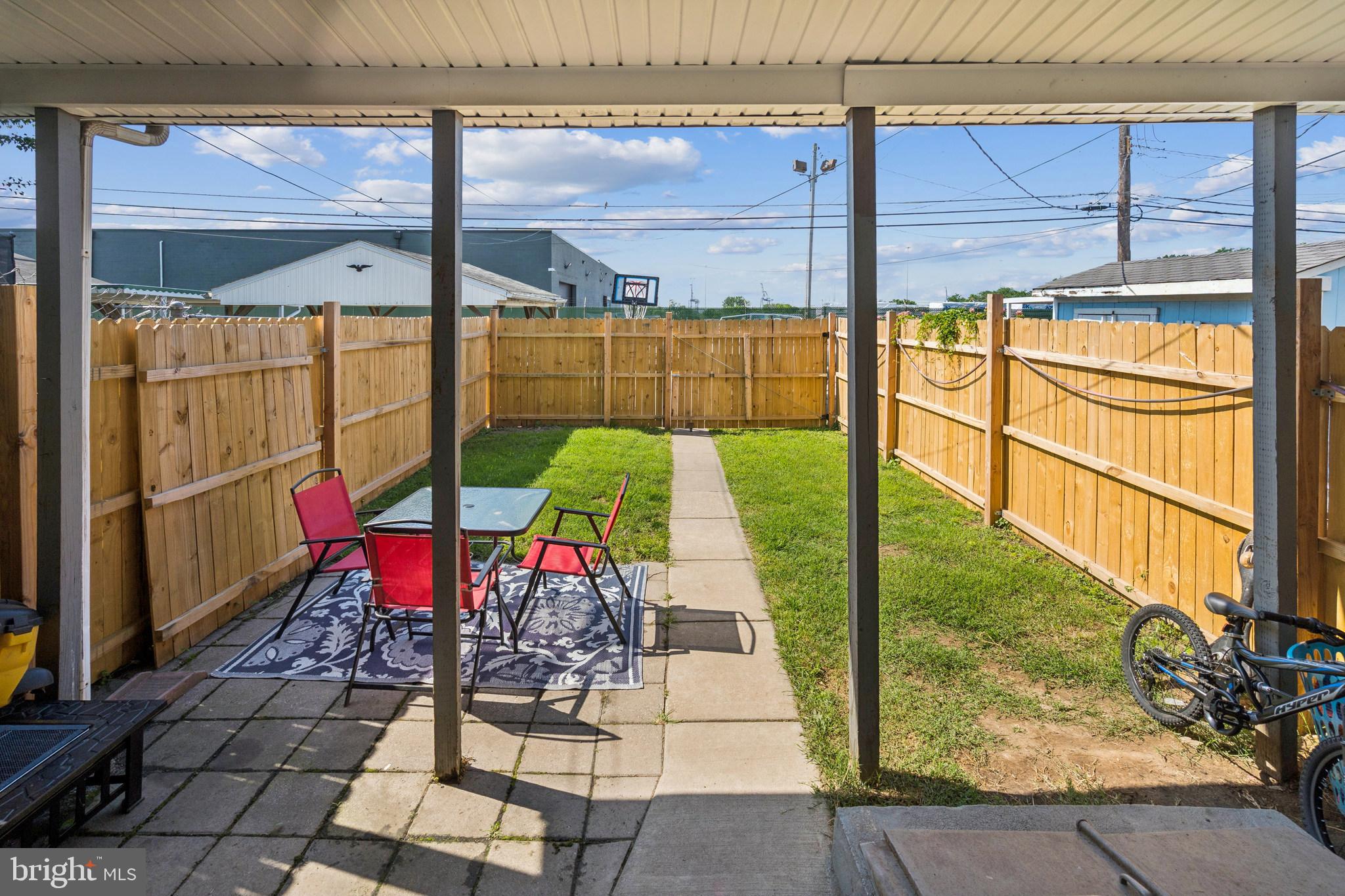 6733 Woodley Road Baltimore, MD 21222 - Photo 24 of 26 Fenced Backyard