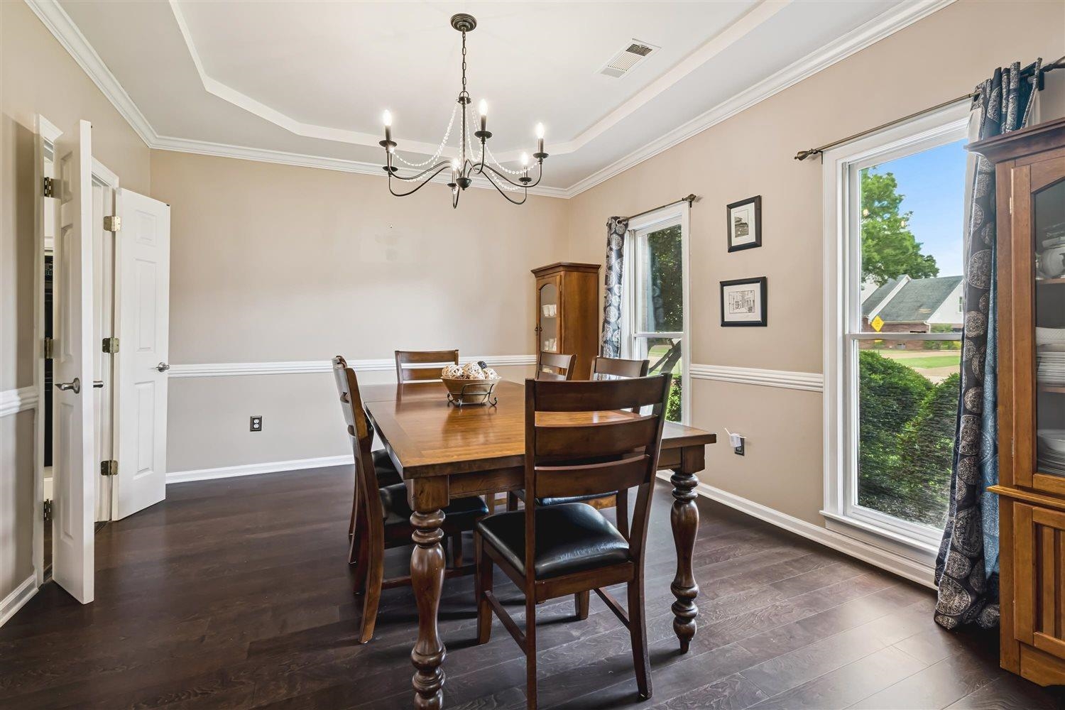1489 John Ridge Drive Collierville, TN 38017 - Photo 10 of 39 a view of a dining room with furniture window and wooden floor