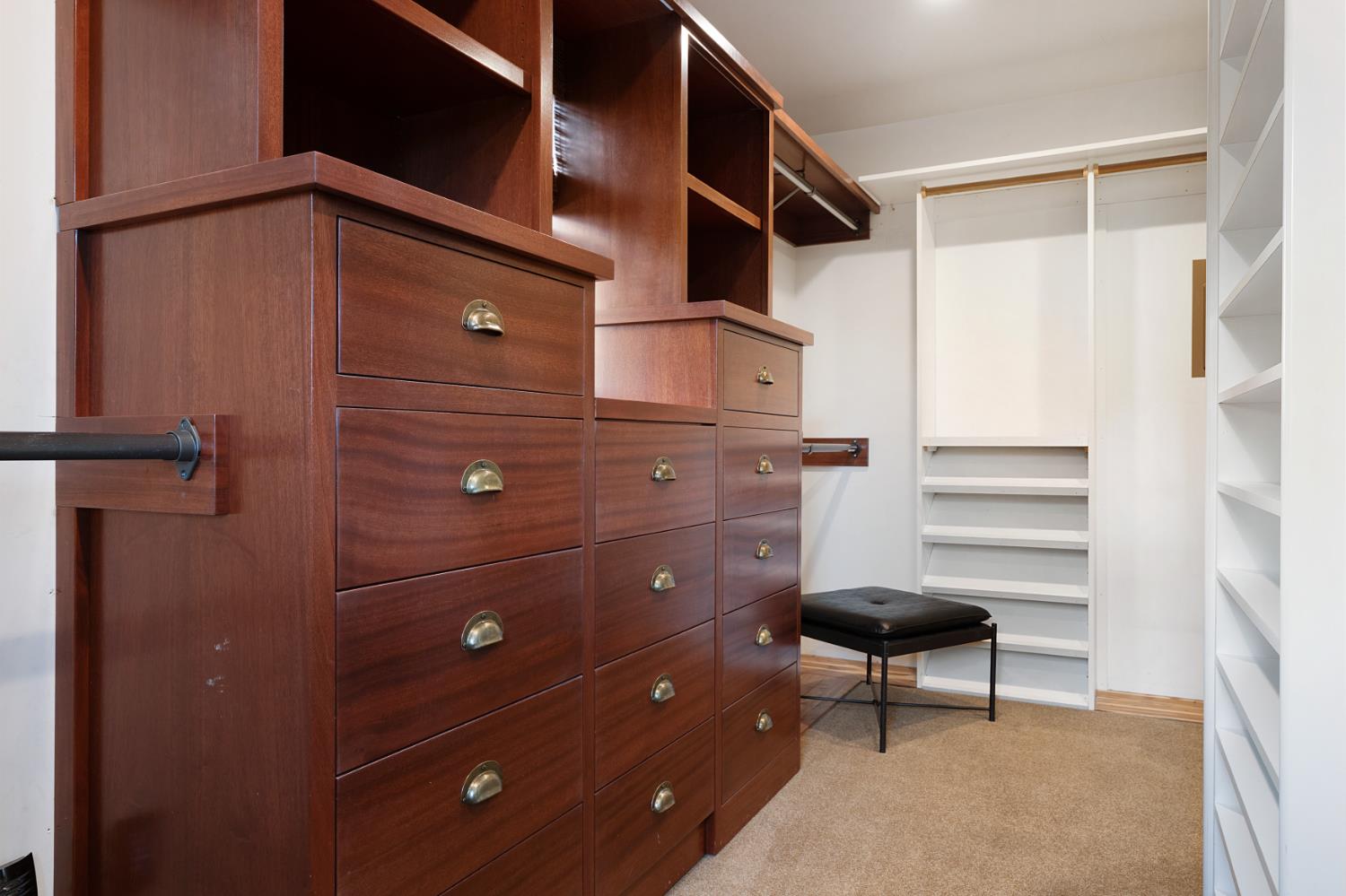 6533 Landis Avenue Carmichael, CA 95608 - Photo 40 of 77 The Primary Suite has a wrap-around walk-in closet with plenty of hanging an drawer space.