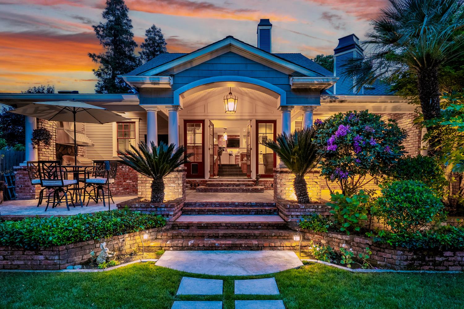 6533 Landis Avenue Carmichael, CA 95608 - Photo 5 of 77 Mature, colorful landscaping enhanced by lighting makes a magical setting. The 12-zone sprinkler system is on timer, both in the front and back, ensuring that the landscaping stays healthy and vibrant.