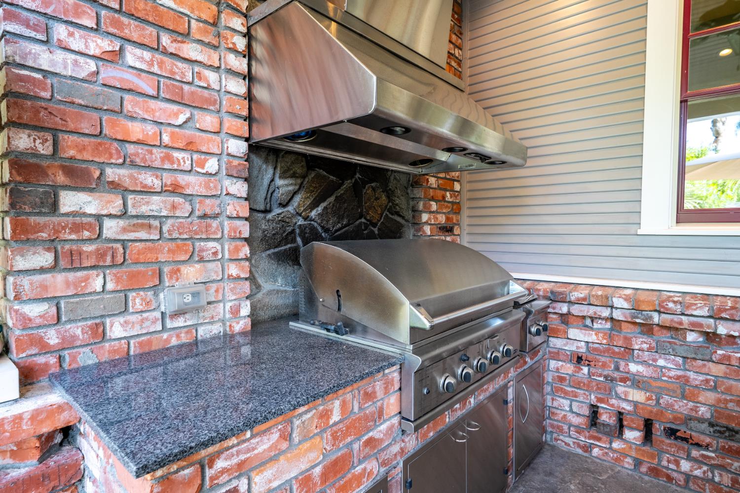 6533 Landis Avenue Carmichael, CA 95608 - Photo 59 of 77 Stainless and brick outdoor kitchen