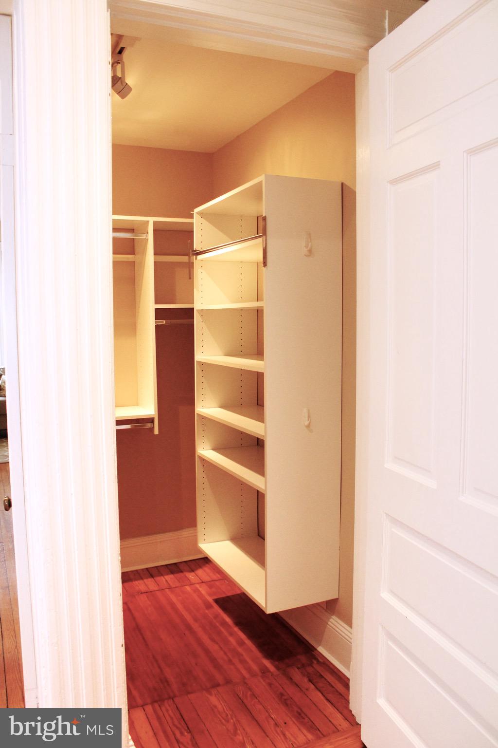 1731 Riggs Place Northwest, Unit 2 Washington, DC 20009 - Photo 14 of 24 a view of walk in closet with empty racks