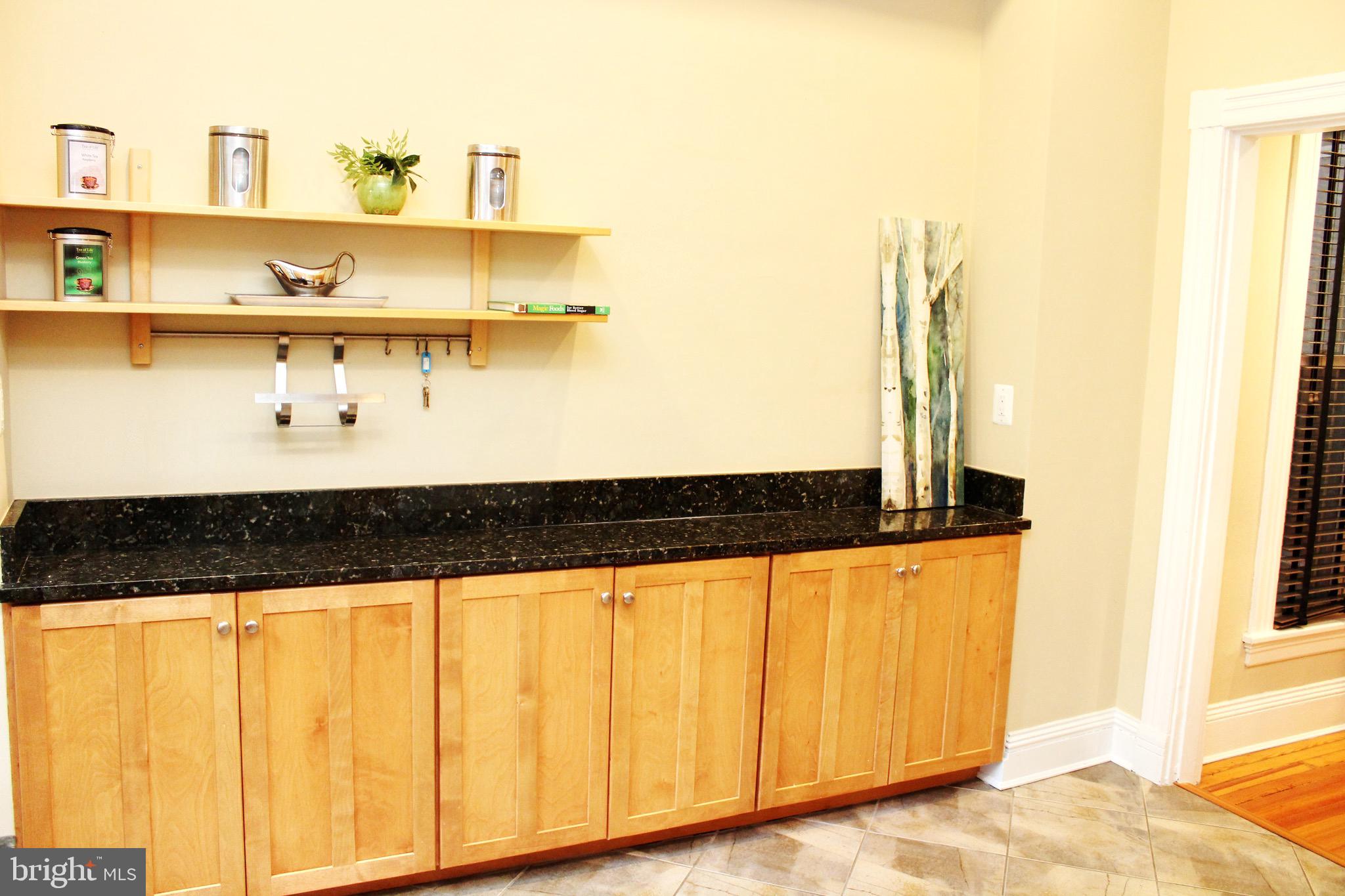 1731 Riggs Place Northwest, Unit 2 Washington, DC 20009 - Photo 22 of 24 a view of a living room with furniture and a window