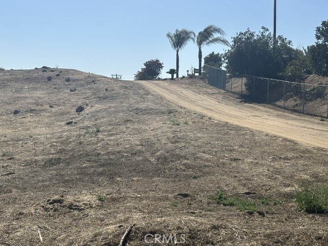 17 Keller Road Winchester, CA 92596 - Photo 9 of 21 a view of a dry yard with wooden fence