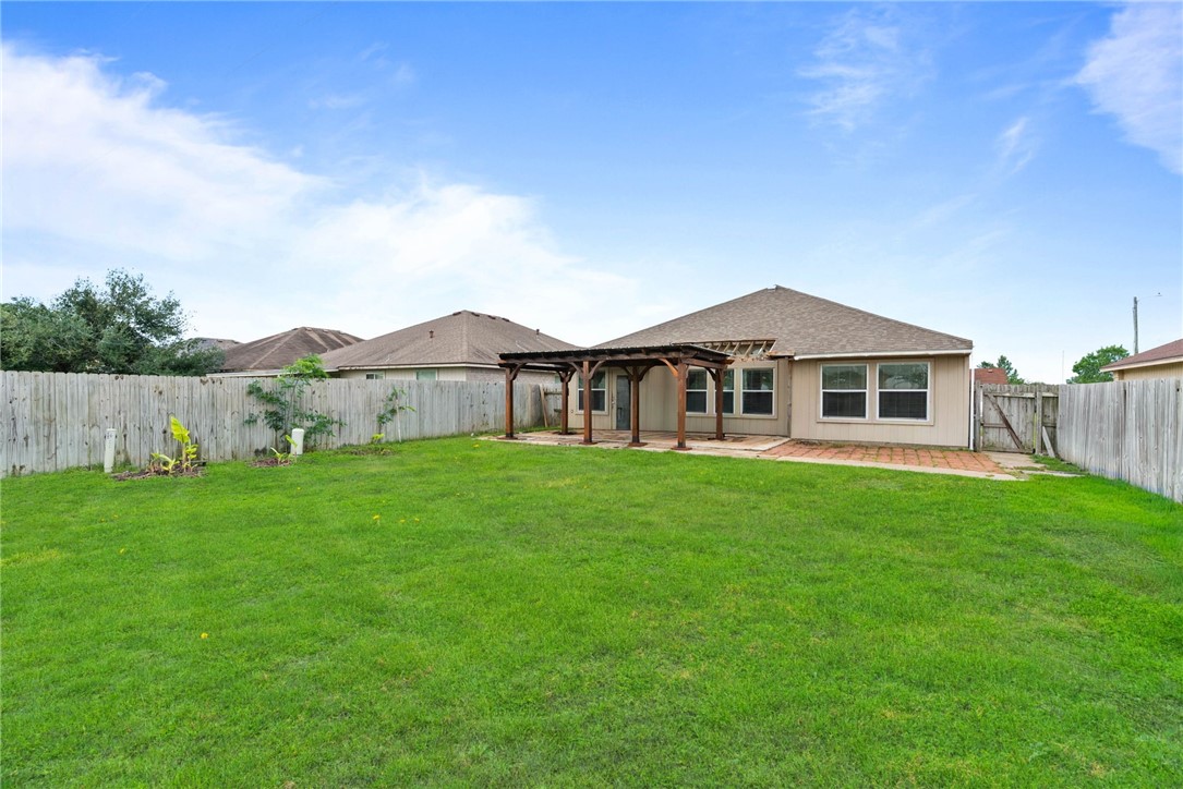 6606 Riding Wind Drive Corpus Christi, TX 78414 - Photo 14 of 15 a house view with a garden space