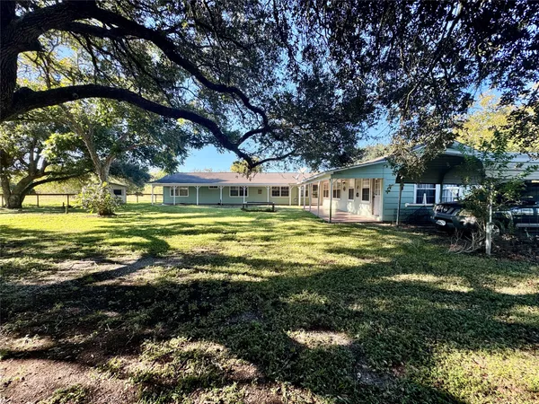 a view of balcony with furniture