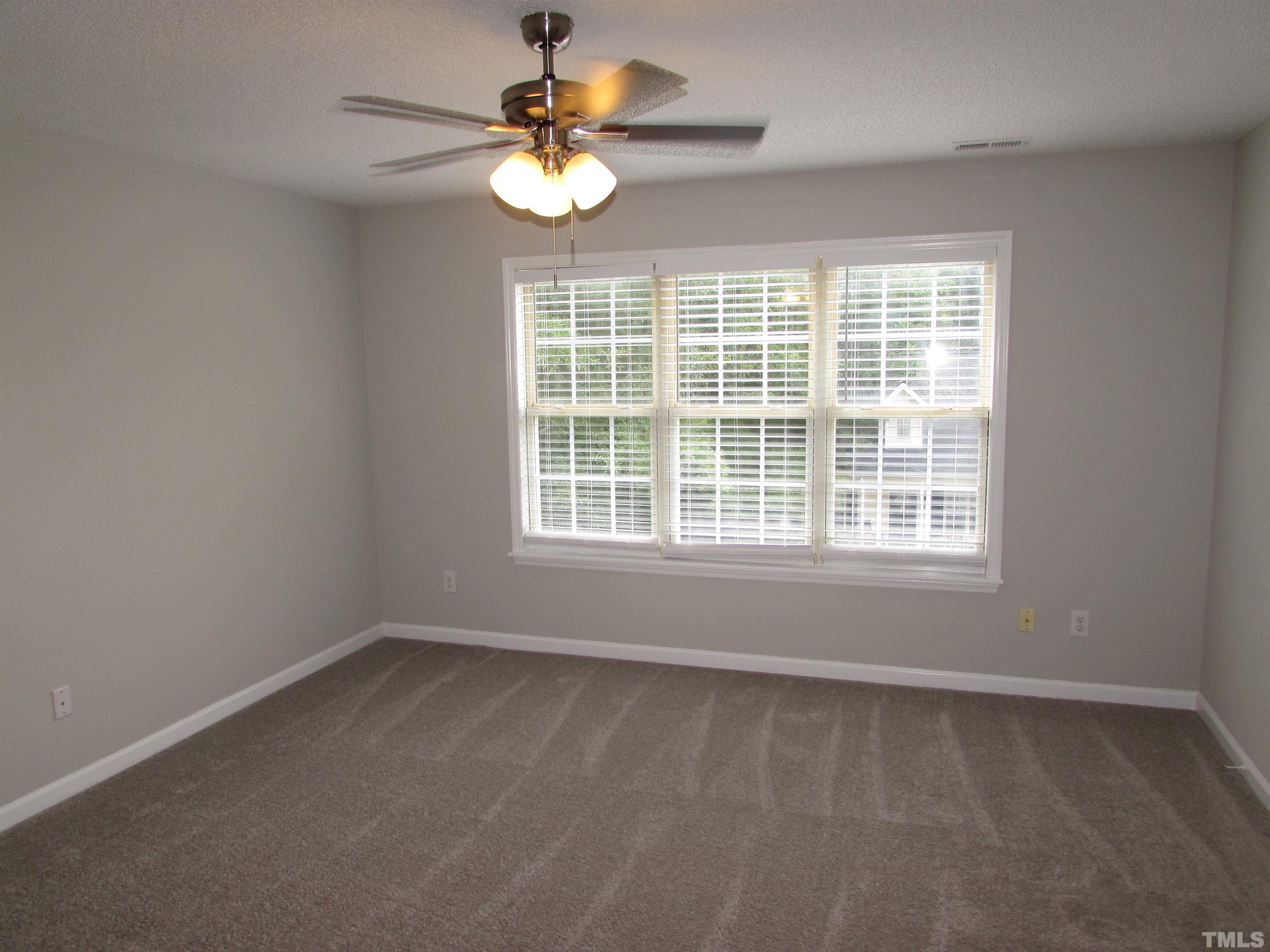 802 Rothshire Court Raleigh, NC 27615 - Photo 18 of 29 an empty room with window