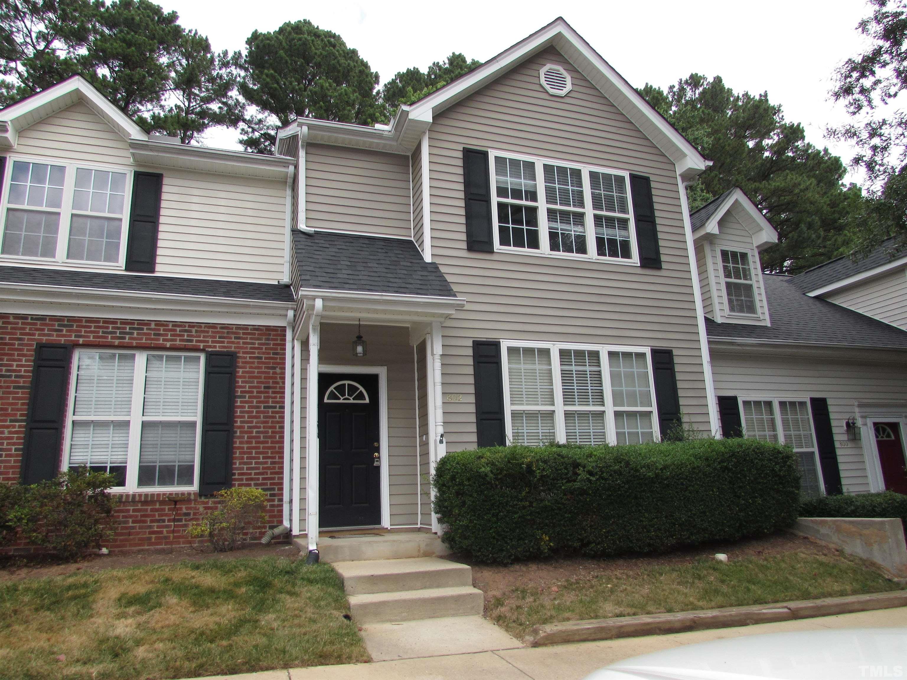 802 Rothshire Court Raleigh, NC 27615 - Photo 2 of 29 a front view of a house with a yard