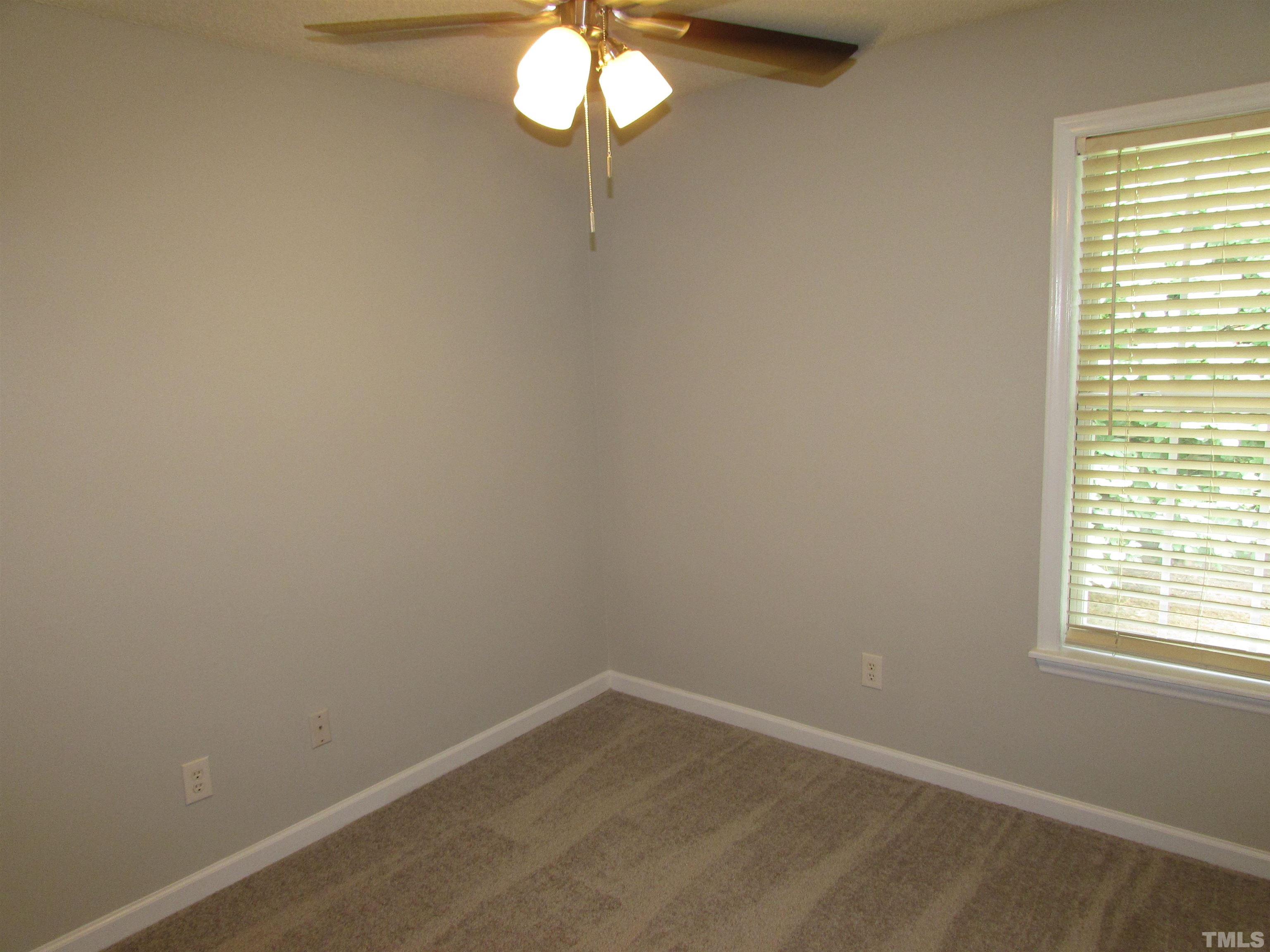 802 Rothshire Court Raleigh, NC 27615 - Photo 23 of 29 a view of a small space with a window
