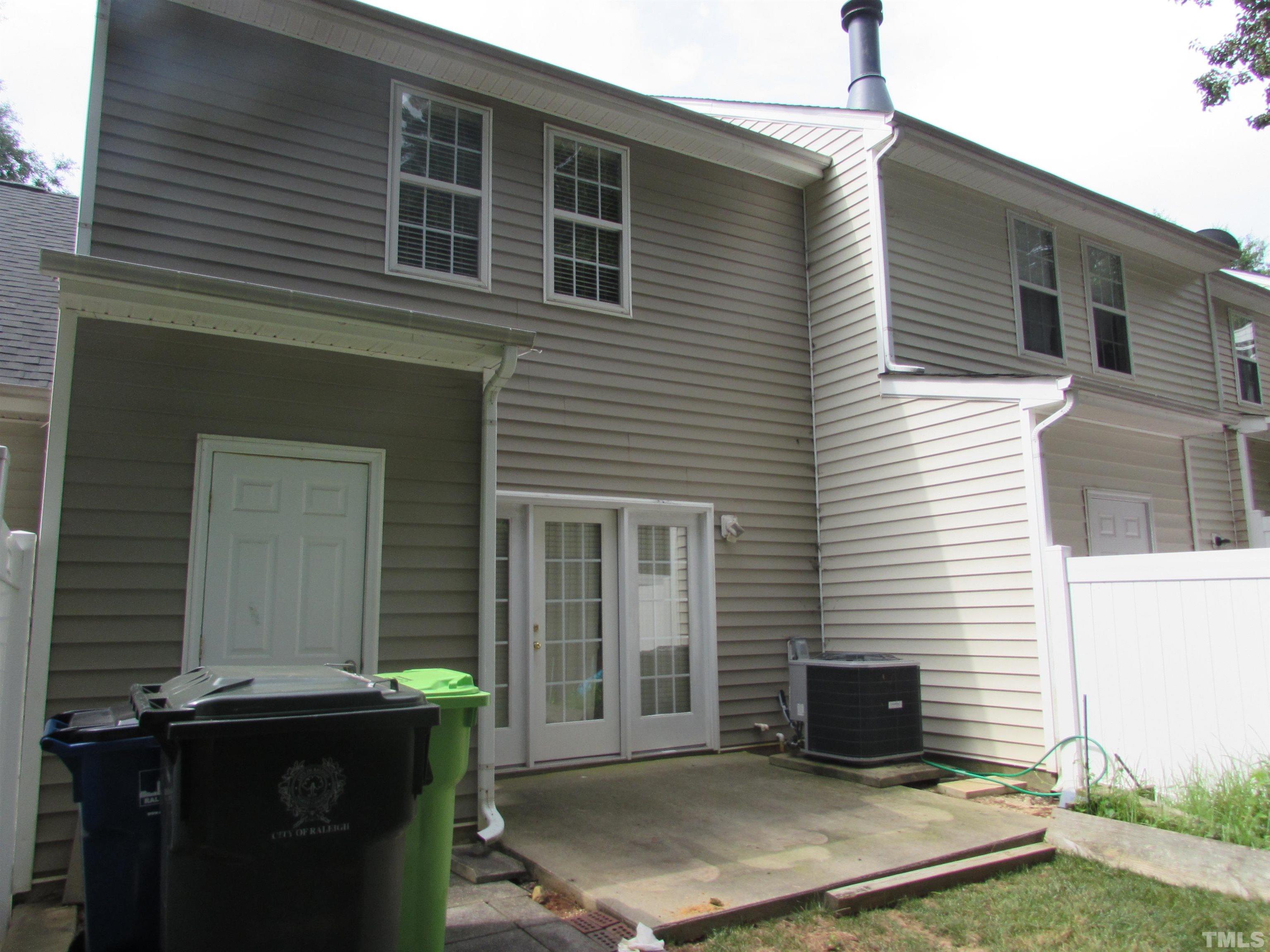 802 Rothshire Court Raleigh, NC 27615 - Photo 26 of 29 a backyard of a house with seating space