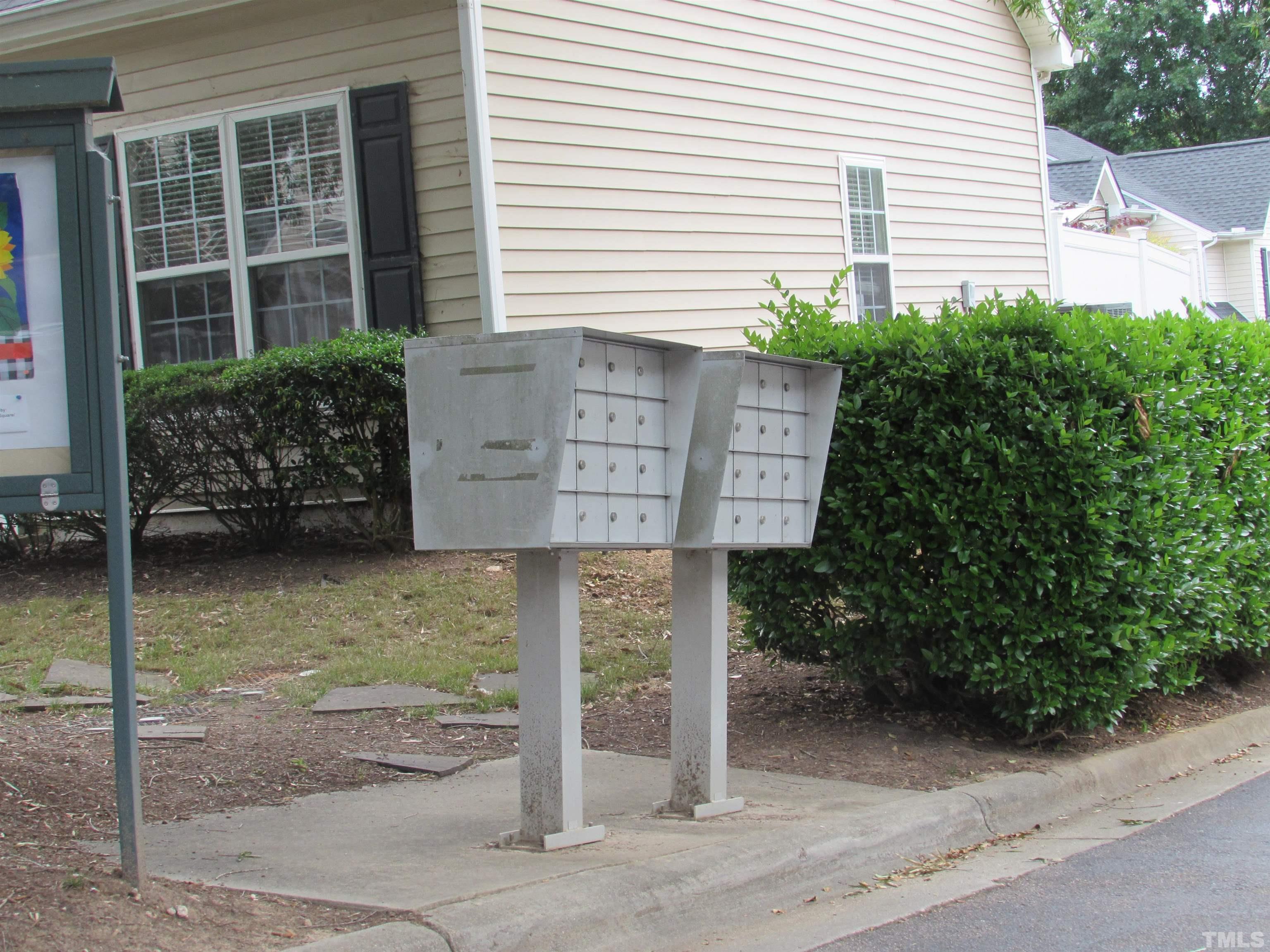 802 Rothshire Court Raleigh, NC 27615 - Photo 28 of 29 a sign on the side of a house