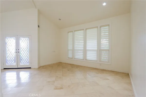 an empty room with windows