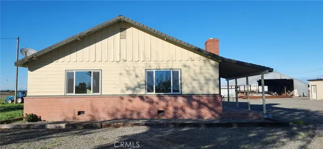 a front view of a house with garage