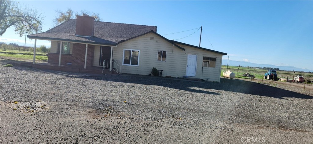 24520 Clark Avenue Orland, CA 95963 - Photo 3 of 13 a view of a house with a yard