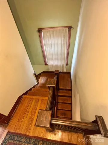 a view of entryway with wooden floor