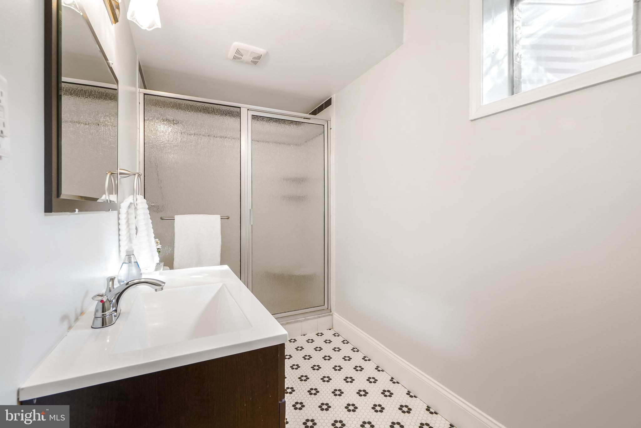 1937 Lyttonsville Road Silver Spring, MD 20910 - Photo 14 of 30 Primary Suite Bathroom