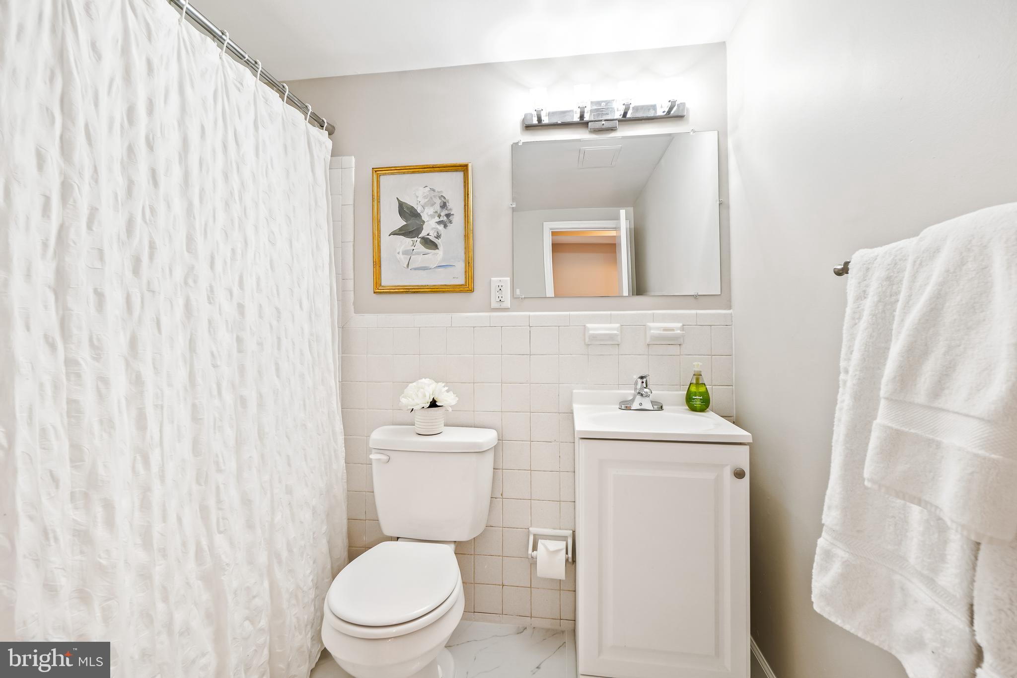 1937 Lyttonsville Road Silver Spring, MD 20910 - Photo 18 of 30 Updated hall bathroom w/ linen closet