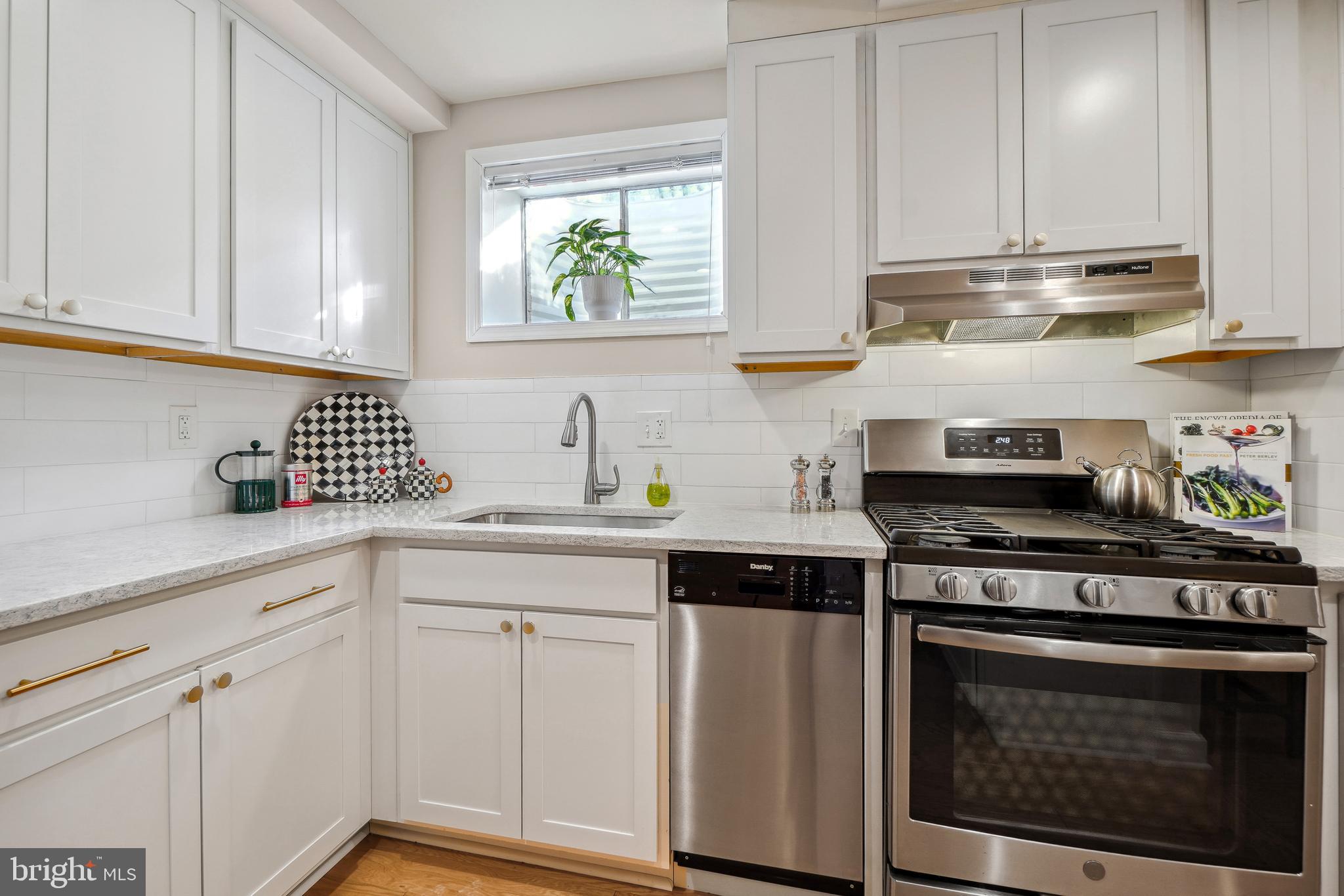 1937 Lyttonsville Road Silver Spring, MD 20910 - Photo 6 of 30 Gas stainless range with range hood