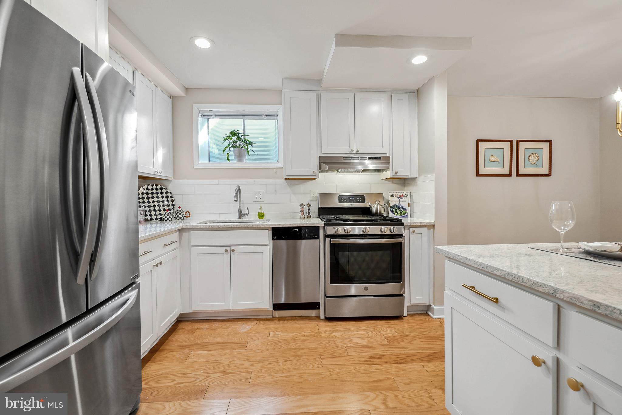 1937 Lyttonsville Road Silver Spring, MD 20910 - Photo 7 of 30 Beautiful white cabinetry w/ quartz countertops