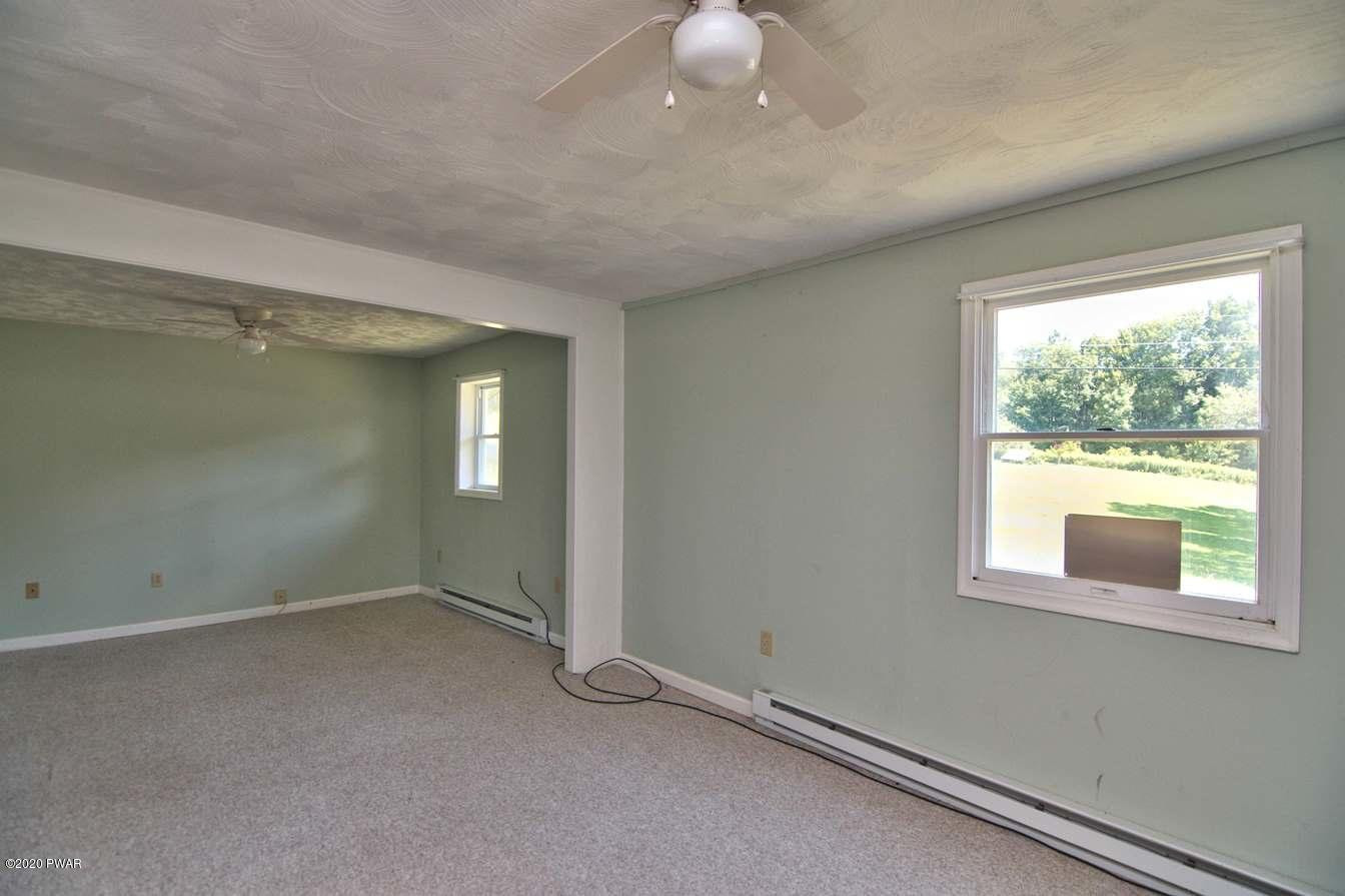 5690 Haas Pond Road Moscow, PA 18444 - Photo 13 of 79 an empty room with a window