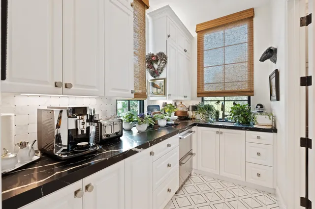 a bed room with a bed and a television