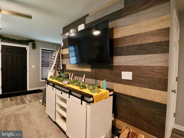 a kitchen with counter top space cabinets and appliances