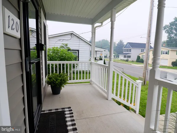 a view of a porch with a yard