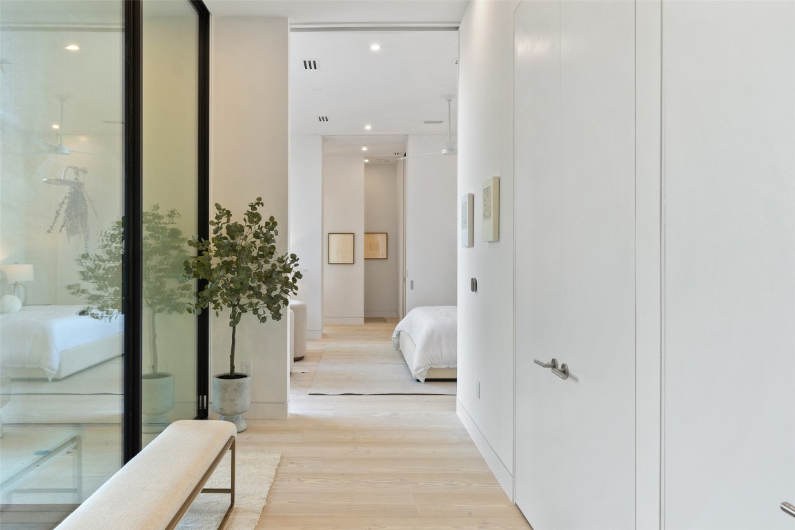 2605 Rockingham Drive Austin, TX 78704 - Photo 14 of 32 Hallway to primary suite.